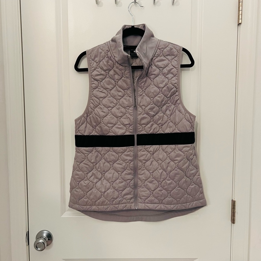 Nike Quilted Sleeveless Vest in Light Mauve with Black Band